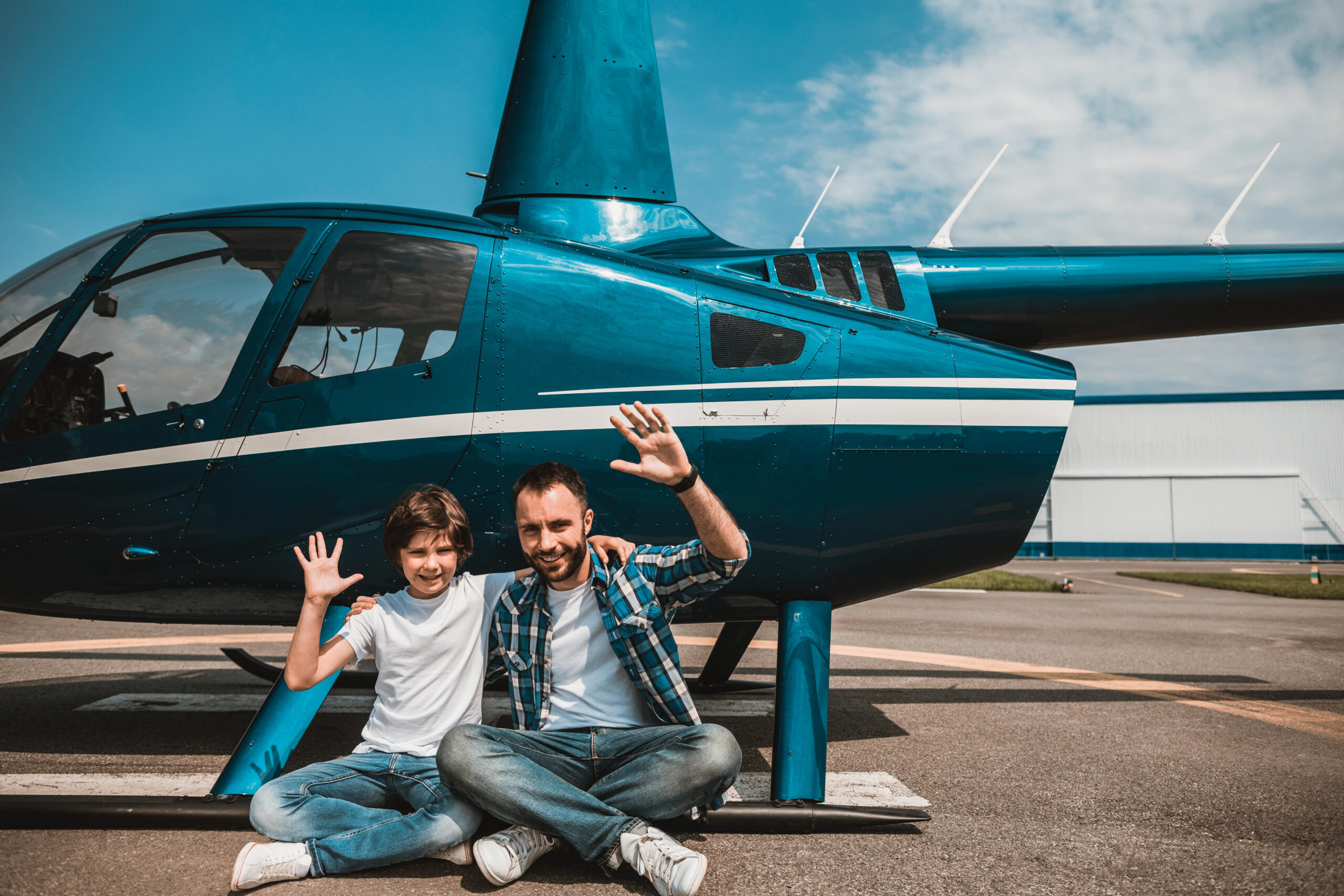 Full length portrait of smiling kid and positive unshaven man gesticulating hands while resting near helicopter outside SSUCv3H4sIAAAAAAAEAJ2RwY6DIBCG75vsOxjOmgjqqvsqzR5GoHZSKw1gm6bx3QuiyZz3xv/9zDD/8P7+yjI2gEPJfrN3VEHjNC3OW/Bo5oDLfOdaoTcWYYowsnVzmPPgF6ddbLEjCV6P4W6Ce/3xzinp7DA2M1QEi7GcMLcMGzvQmv+7Mh3+jigw6lm+toFJEKsnDSnIKV1l16fX9kajPVBpQzQsCg1J+TASplhQkc53ixLnkZQZf9GWbiys3NwImI3fJtmDMRVWGiWveNv1ZdM3PyWvS8E5O77ByCsqOmv6mQsGy74IRxU7iWboqo6fC1EObVErwQtom3PR15wL6GtotAgbXD999CVGJgIAAA==